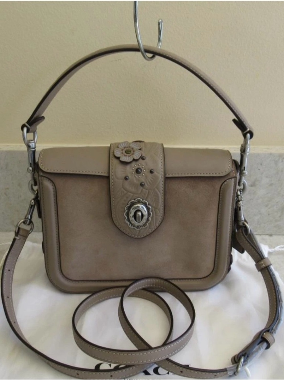 New Coach Page
Embossed Tea Suede
Leather Handle
Crossbody Bag